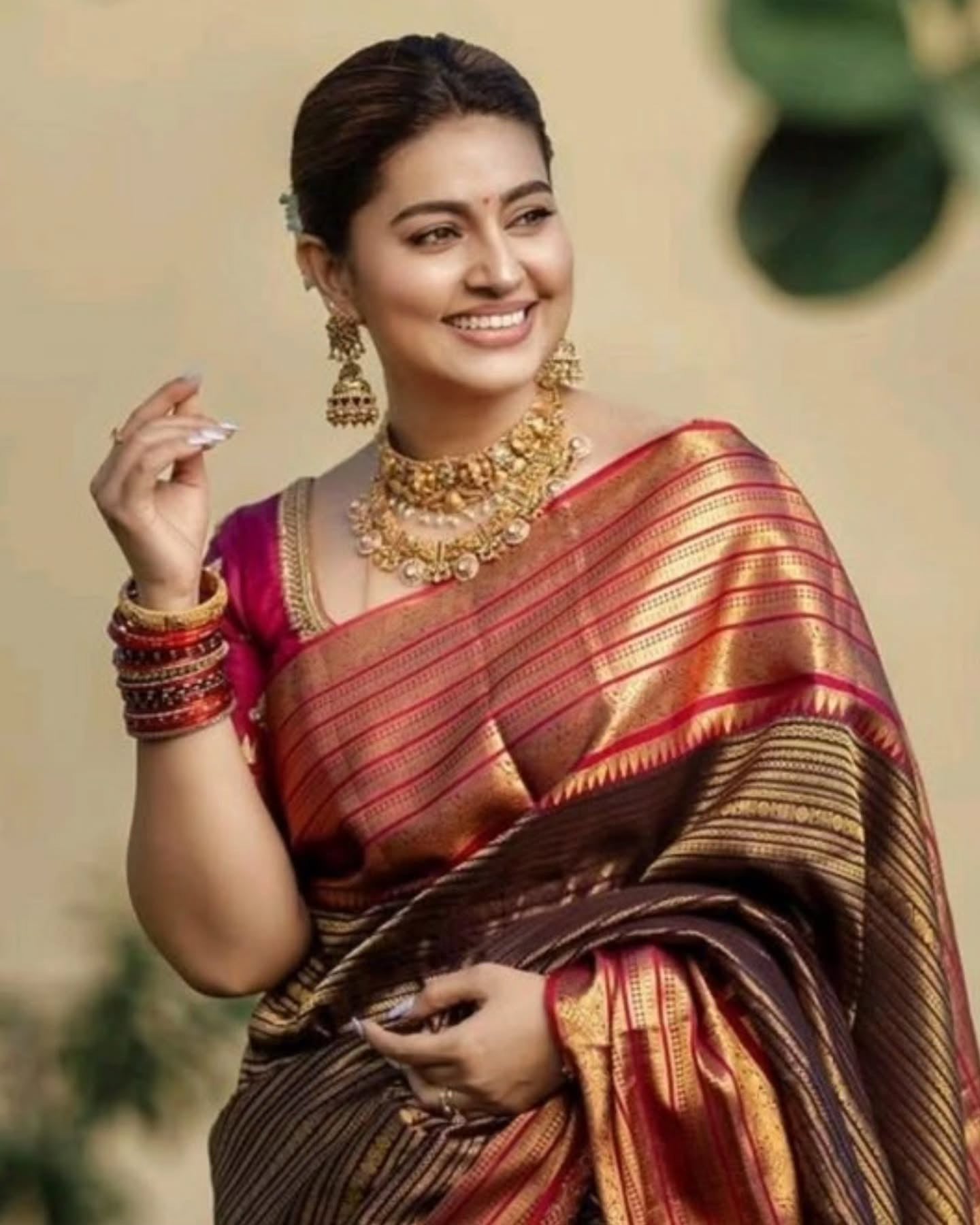 “Royal Maroon & Gold Banarasi Silk Saree with Rich Zari Border”