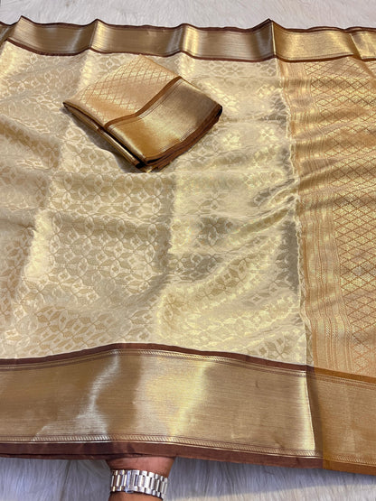 Graceful Cream Katan Silk Banarasi Saree with Brown Border