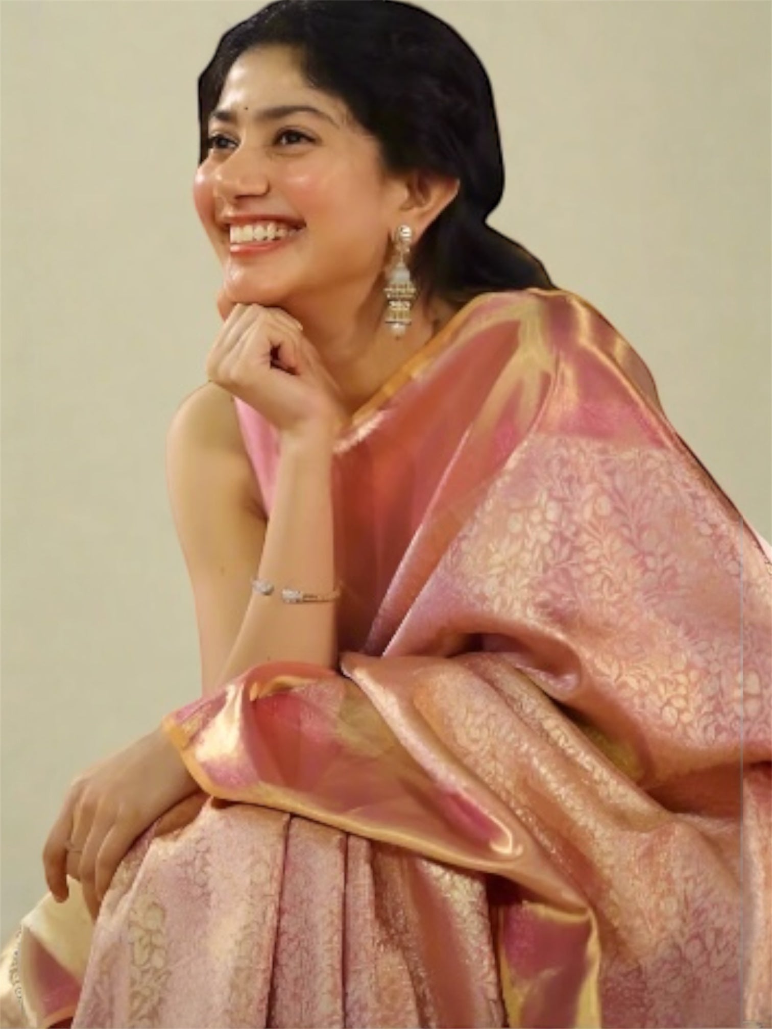 Sai Pallavi Inspired Elegant Peach Pink Tissue Banarasi Saree with Rich Golden Border