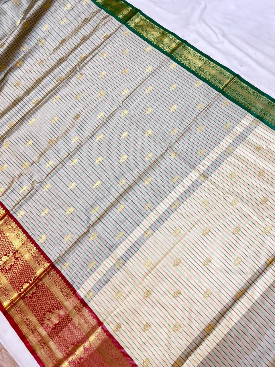 THE ELEGANT OFF WHITE CHECKS BANARASI KATAN SILK SAREE WITH RICH RED ZARI BORDER