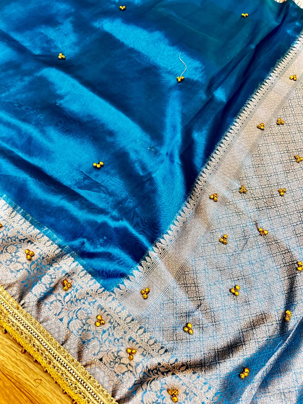 Premium Teal Blue Banarasi Tissue Ghunghru Saree with Attached Lace Work & Golden Zari Border