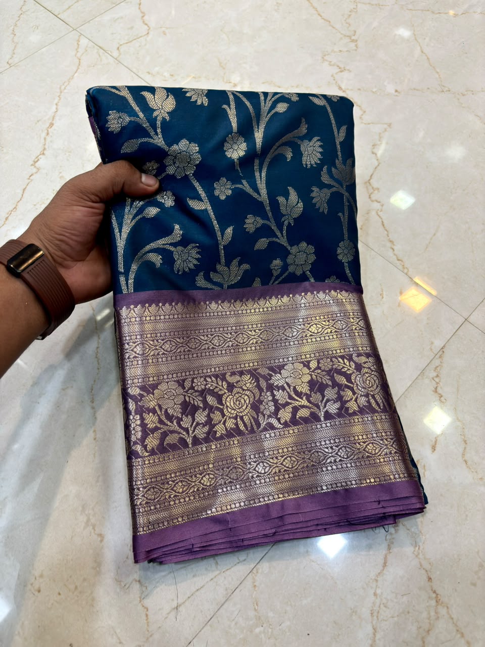 The Elegant Royal Teal Banarasi Katan Silk Saree with Rich Lavender Zari Borde