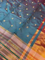 Royal Peacock Blue Banarasi Katan Silk Saree with Rich Zari Buti & Contrast Copper Gold Pall
