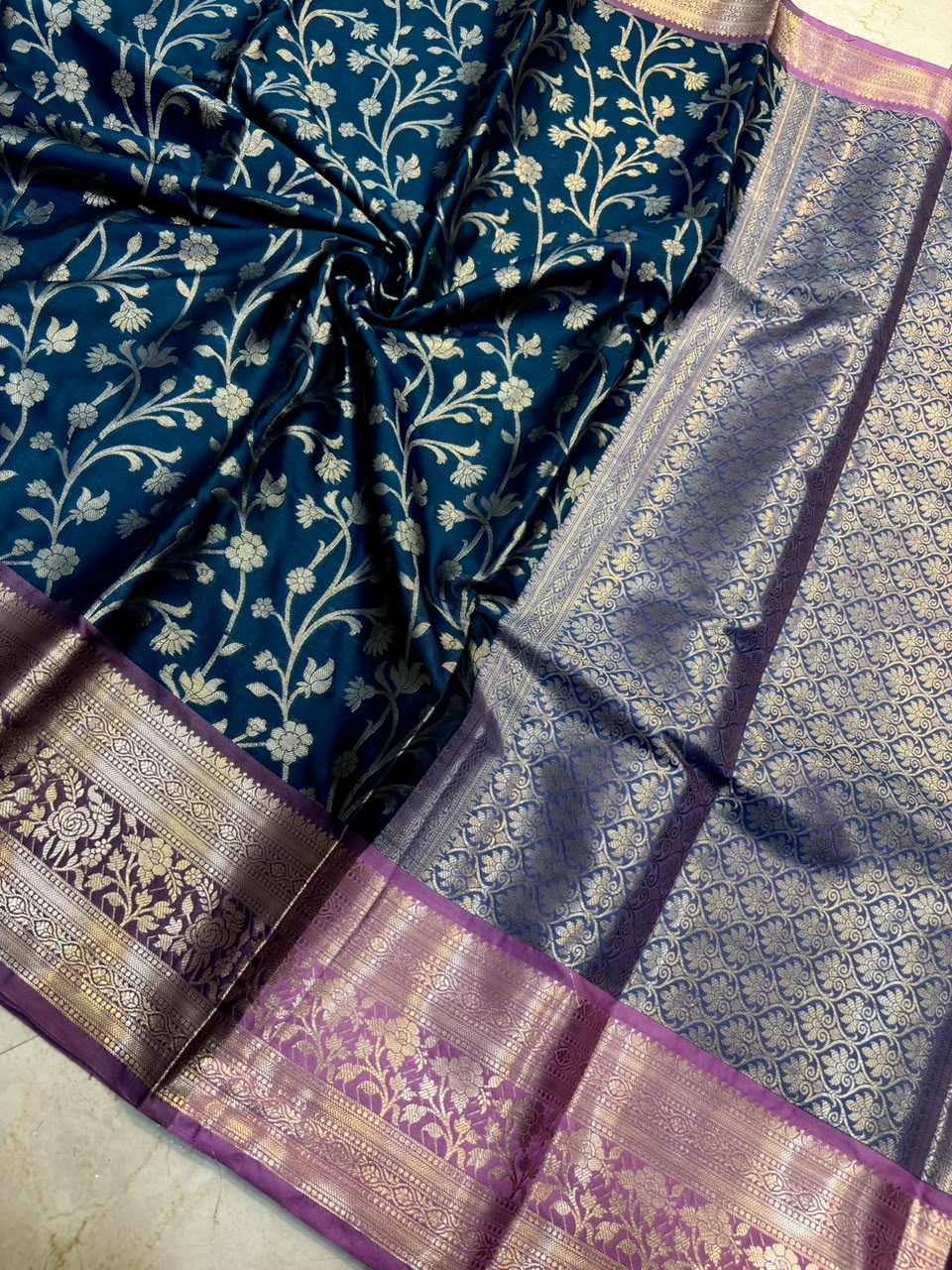 The Elegant Royal Teal Banarasi Katan Silk Saree with Rich Lavender Zari Borde