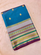 Royal Peacock Blue Banarasi Katan Silk Saree with Rich Zari Buti & Contrast Copper Gold Pall