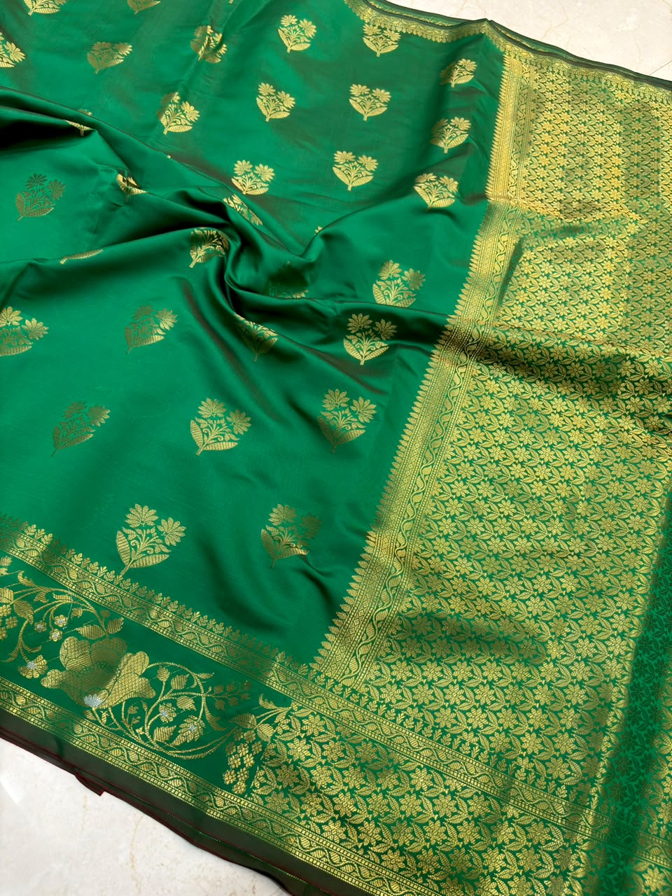 Elegant Emerald Green Banarasi Katan Saree with Rich Zari Border