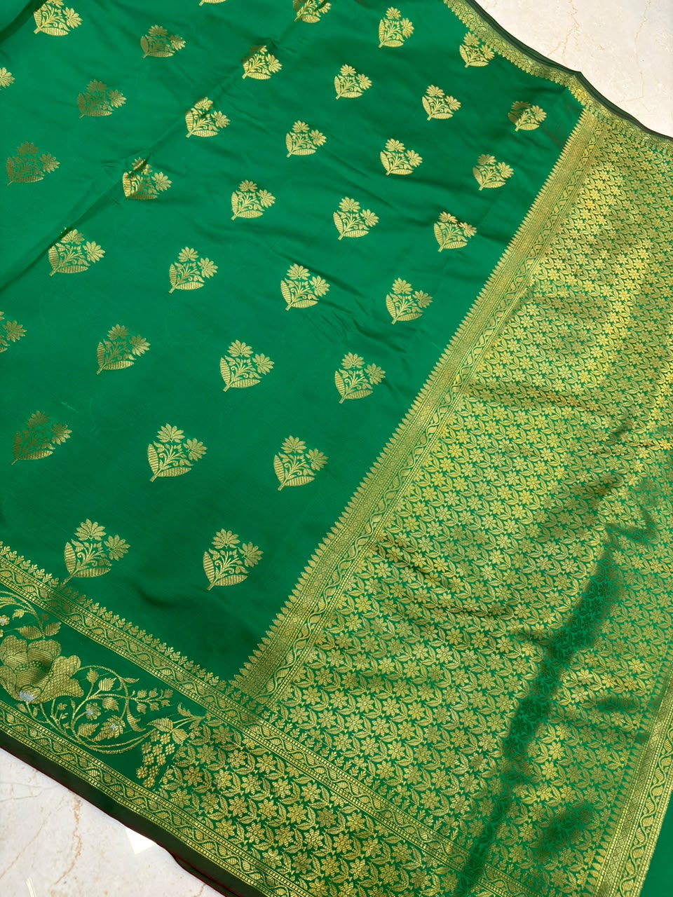Elegant Emerald Green Banarasi Katan Saree with Rich Zari Border